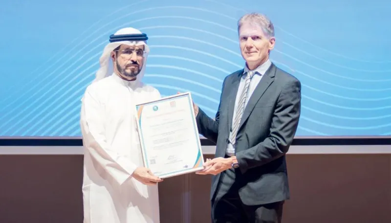 His Excellency Saeed Mohammed Al Tayer receiving recognition at the International Best Practice Competition ceremony alongside Dr Robin Mann.