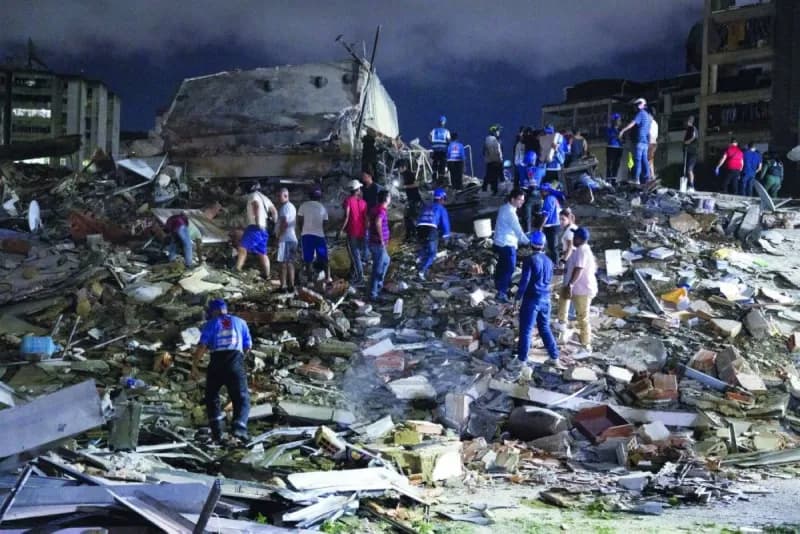 Rescue workers and emergency personnel search through collapsed buildings and rubble in Venezuela following a powerful 7.5-magnitude earthquake that struck the country's northern coast.