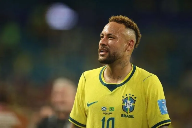 Neymar in action on the football pitch during a competitive match.