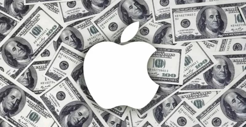 Apple MacBook and iPad devices displayed on a surface, illustrating the company's price increases amid a global memory chip shortage.