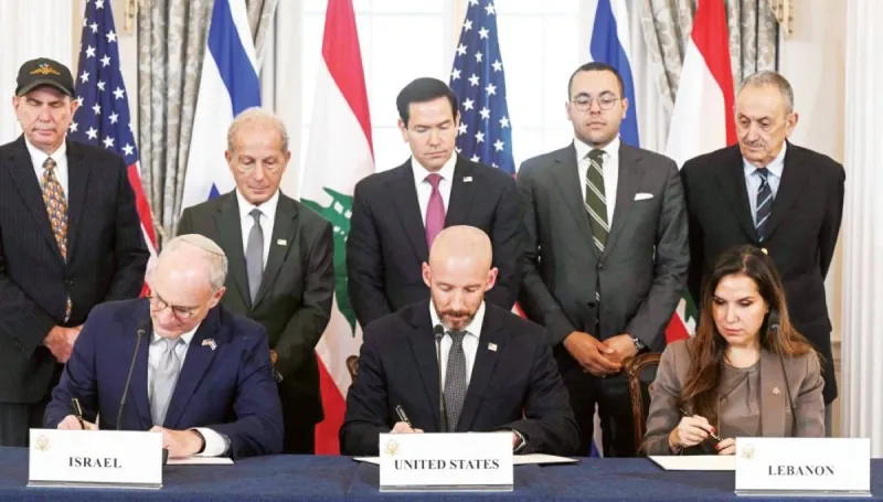 Flags of the United States, Israel, and Lebanon raised during the framework agreement signing ceremony in Washington.