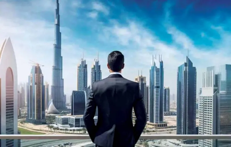 An aerial view of Dubai's modern skyline and urban infrastructure, reflecting the emirate's rapid economic development and growth.