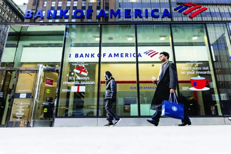 A Bank of America logo displayed outside one of the bank's branches, representing the institution's latest mid-year global economic outlook report.