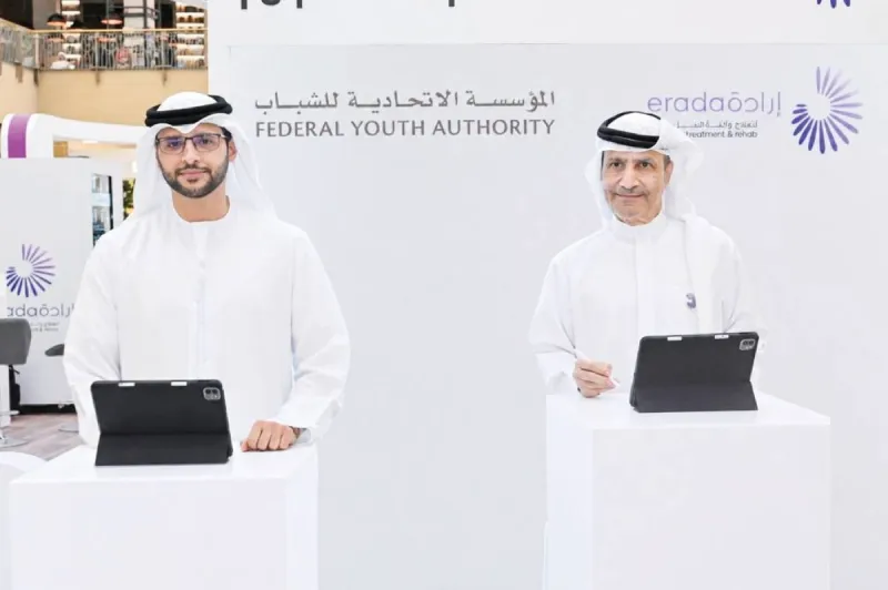 Khalid Mohammed Al Nuaimi and Abdul Razzaq Amiri signing the memorandum of understanding between the Federal Youth Authority and Irada Centre for Treatment and Rehabilitation in Dubai.