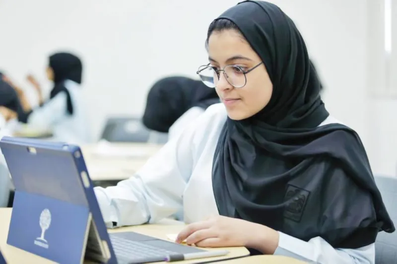 Grade 12 students sitting electronic examinations at a UAE school during the third-term exam period.