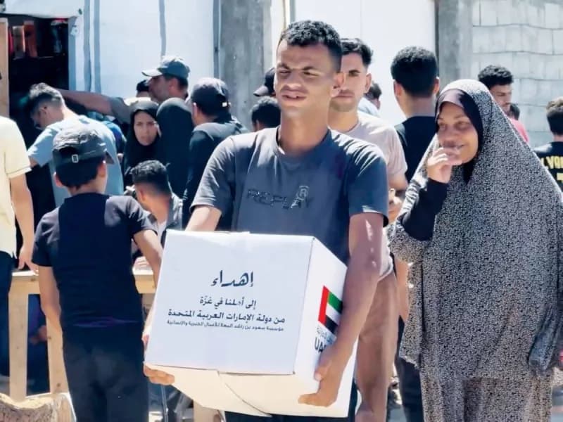 A UAE humanitarian aid convoy loaded with food supplies and infant formula prepares to enter the Gaza Strip as part of Operation Noble Knight 3.