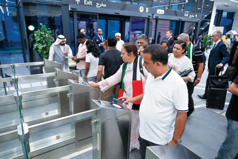 .As the first journey's whistle sounded in sync with sunrise, the train departed Fujairah station at 5:34 a.m. amid feelings of joy and anticipation, heading to Mohamed bin Zayed City station in Abu Dhabi.During the journey, passengers enjoyed a comprehensive modern travel experience that included comfortable seats, wireless internet service, charging ports for electronic devices at every seat, as well as dedicated luggage spaces and business-class services designed to provide the highest levels of comfort and luxury.Hamad Mansour Al Blooshi expressed his immense happiness at participating in this historic moment, affirming that being chosen as the first passenger aboard Etihad Rail is a great source of pride and honour for him.Athra Al Mansoori, Executive Director of the Commercial Sector at Etihad Rail Passenger Services, confirmed in statements to Al Bayan that 30 June is a historic milestone in the national transport journey.She noted that the departure of the first passenger train at sunrise from Fujairah to Abu Dhabi embodies the UAE's ambitions towards a more connected and sustainable future.She added that travellers enjoy a unique opportunity during the journey to take in the stunning natural scenery along the route, noting that passengers will benefit during the first week from a complimentary menu with an Emirati flavour, prepared by national hands.In Abu Dhabi, Mohamed bin Zayed City station witnessed another historic moment as the first passenger train arrived amid a festive atmosphere filled with feelings of joy and pride. The train was received by a number of officials, guests, and community members who joined in celebrating the occasion.Emirati heritage arts also lent an authentic celebratory character to the reception ceremony, as folk performances and traditional songs blended with feelings of pride.A sophisticated ticketing section was designated, relying on a modern technological system that reduced the time to purchase and receive a ticket to just 15 seconds, contributing to expediting travel procedures and ensuring passengers reach the train easily and on time.Etihad Rail also announced its cooperation with the Integrated Transport Centre
