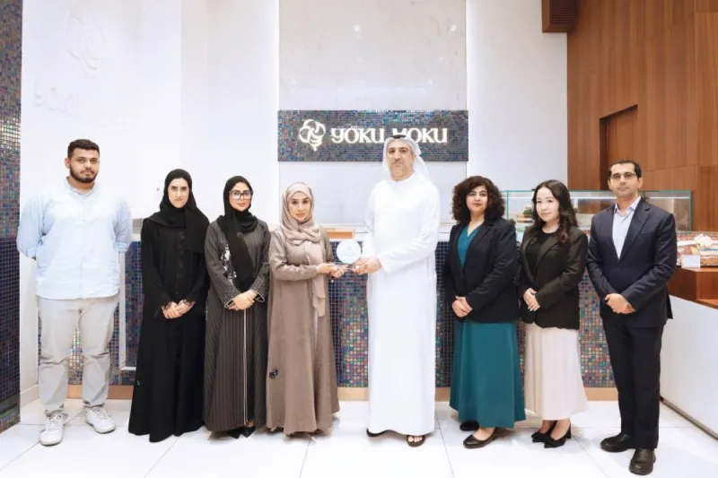 Three restaurant brands receiving the Dubai Waqf Mark award from the Mohammed bin Rashid Global Centre for Endowment and Gift Consultancy.