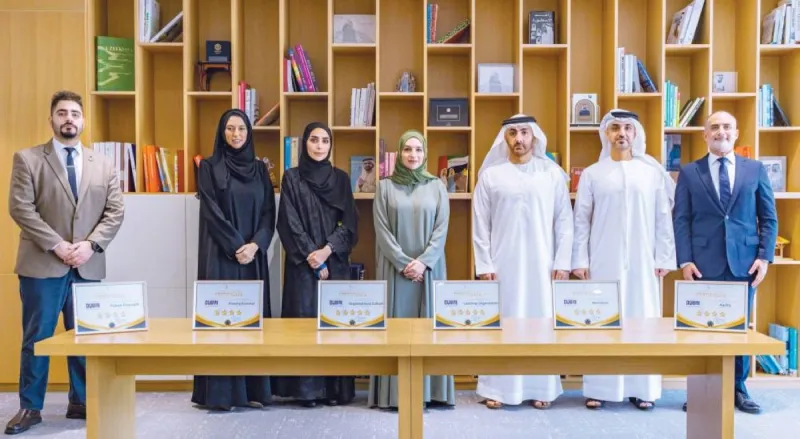 Officials from Dubai Culture pose with their six international recognition certificates from the European Excellence and Agility Organisation.