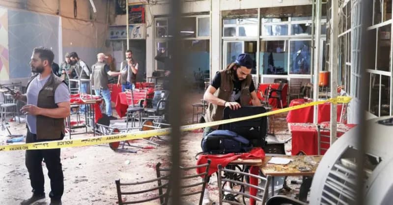 Emergency responders and security forces at the scene of a café explosion in central Damascus near the Palace of Justice.