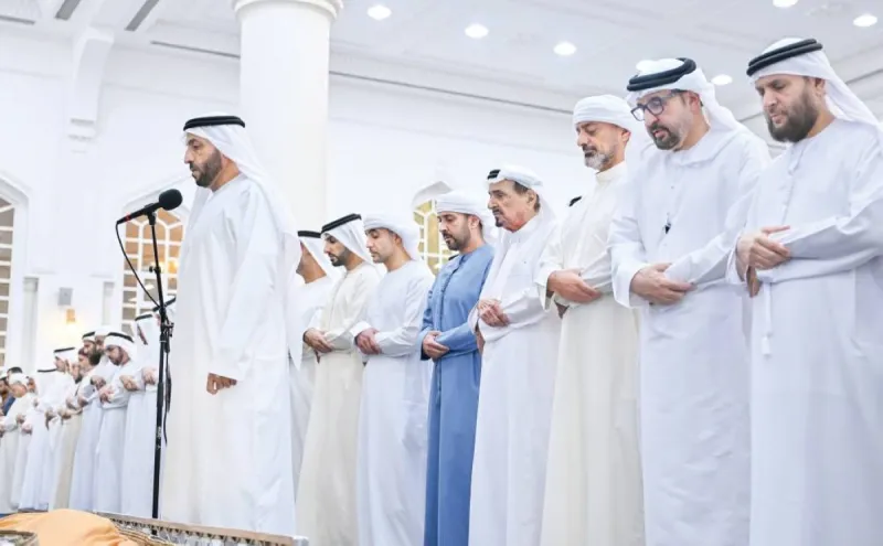 Sheikh Humaid bin Rashid Al Nuaimi and Sheikh Ammar bin Humaid Al Nuaimi performing the funeral prayer for Mansour Al Zaabi at Sheikh Zayed Mosque in Ajman.