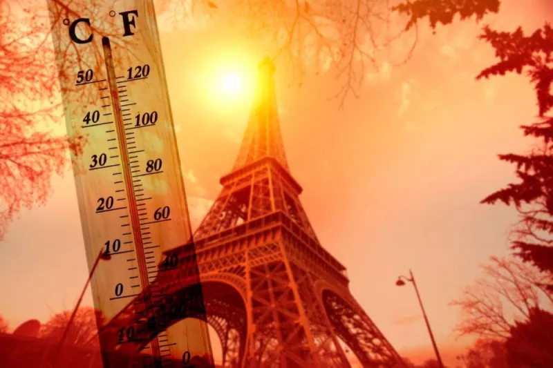 People seeking shade or cooling during an intense European heatwave, with temperatures approaching record highs.