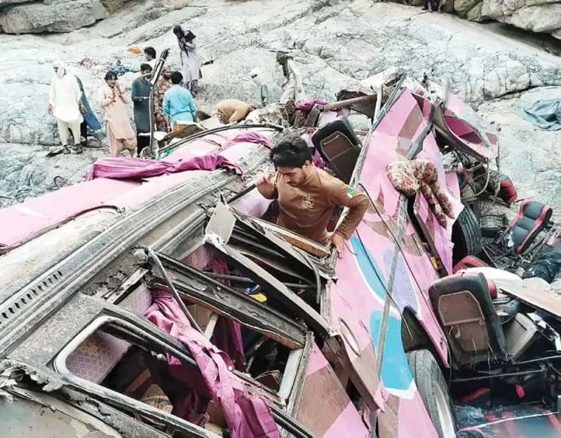A passenger bus that veered off a mountain road and plunged into a narrow valley in the remote Dana Sar area of Balochistan, Pakistan.