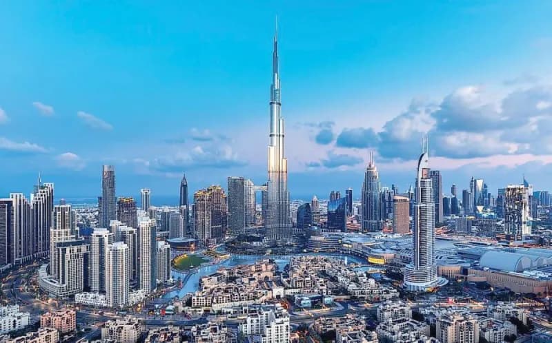 Dubai's iconic skyline featuring the Burj Khalifa towering above a dense cluster of skyscrapers exceeding 200 metres in height.