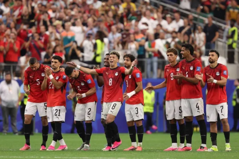 Egypt players celebrate after defeating Australia in a penalty shootout to advance to the round of 16 at the 2026 FIFA World Cup.