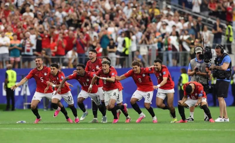 Egypt national football team players celebrating their penalty shootout victory over Australia at the 2026 FIFA World Cup.