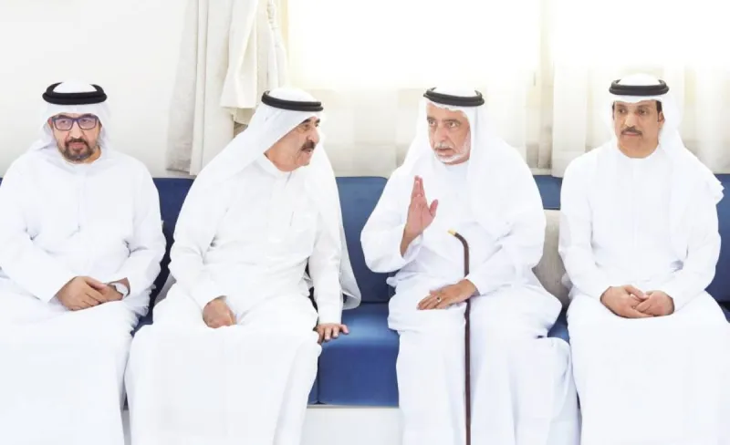 Sheikh Saud bin Rashid Al Mualla offering condolences at the Amin Al Sharafa Council in Ajman following the death of Mansour Saif Al Zaabi.
