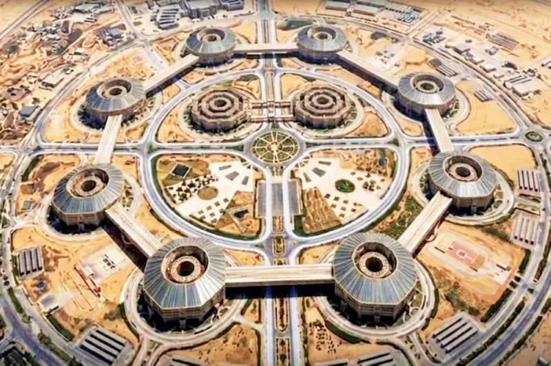 An aerial view of Egypt's Octagon strategic command headquarters in the New Administrative Capital, showing its circular arrangement of octagonal buildings.