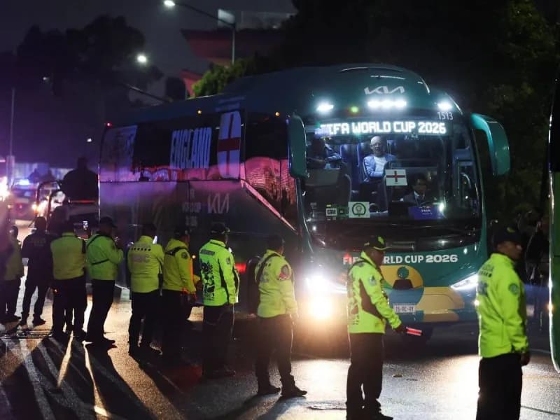 England team bus surrounded by Mexico fans and heavy police presence outside the team hotel in Mexico City.