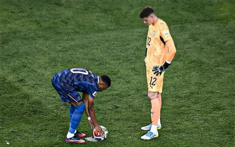 Kylian Mbappé reacts after scoring a penalty against Paraguay at the 2026 FIFA World Cup.