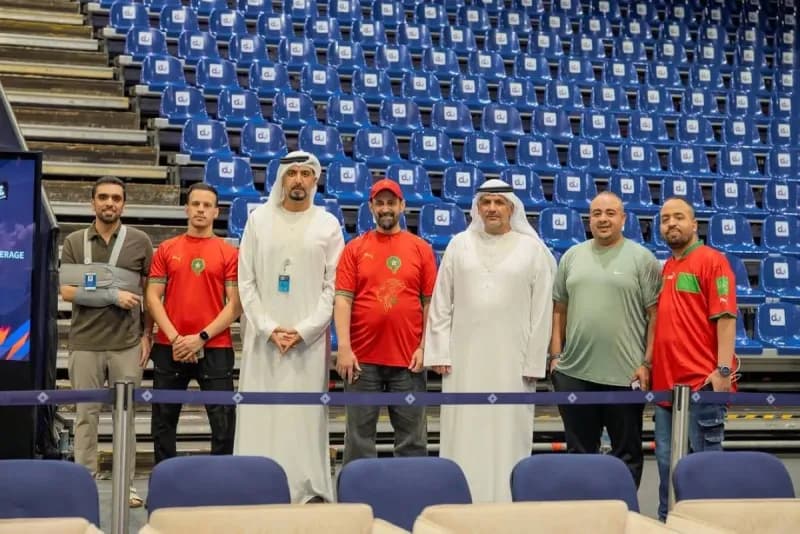 Moroccan fans gathered at the Dubai World Trade Centre fan zone to watch a FIFA World Cup 2026 match on a large screen.