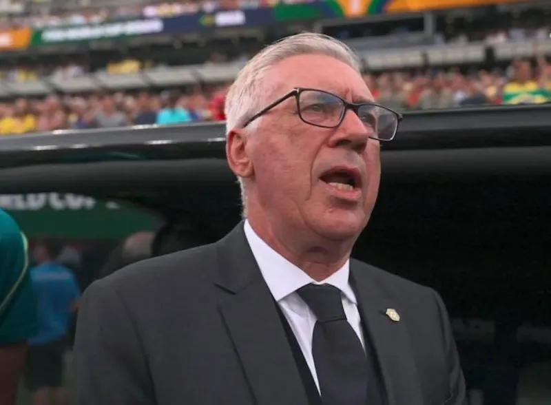 Carlo Ancelotti singing the Brazilian national anthem pitchside ahead of Brazil's World Cup Round of 16 match against Norway at MetLife Stadium.