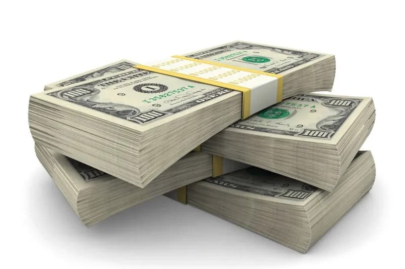 Currency trading screens displaying dollar, yen, and euro exchange rate movements in a financial market setting.