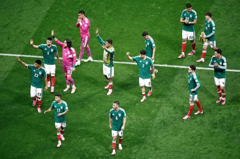 Mexican fans react with grief and disappointment following their national team's elimination from the 2026 FIFA World Cup after a round-of-16 defeat to England.