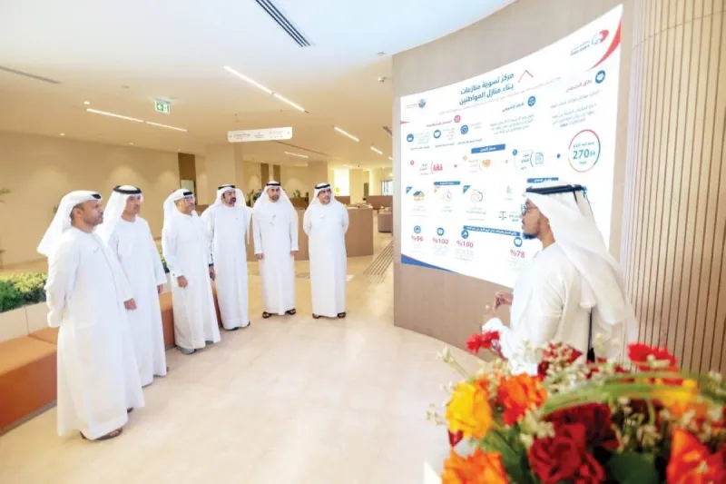 Officials from Dubai Courts and the Dubai Department of Economy and Tourism during a visit to the Centre for Settlement of Citizens' Home Construction Disputes.