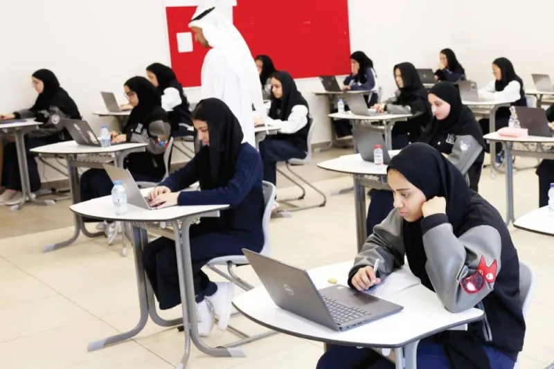 Students arriving at a school in the UAE to sit makeup examinations for the end of the third academic term.