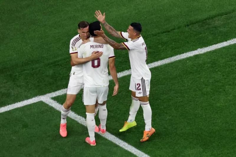 Spain coach Luis de la Fuente watches from the touchline as his substitutes help La Roja overcome Portugal in a tense World Cup round-of-16 clash.