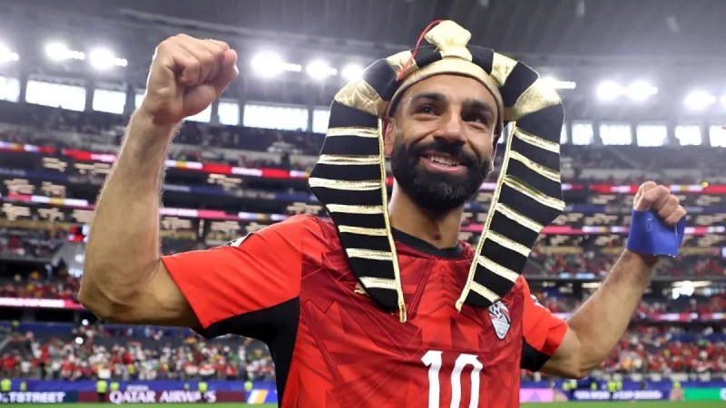 Mohamed Salah celebrates with his Egypt teammates after their World Cup round-of-32 penalty shootout victory over Australia.