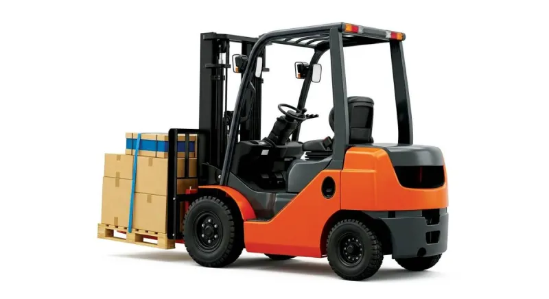 A forklift operating inside an industrial warehouse at a Dubai work site.