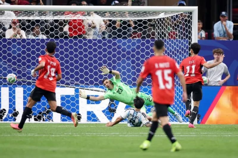 Egyptian national football team players in action during their 2026 World Cup match against Argentina in Atlanta.
