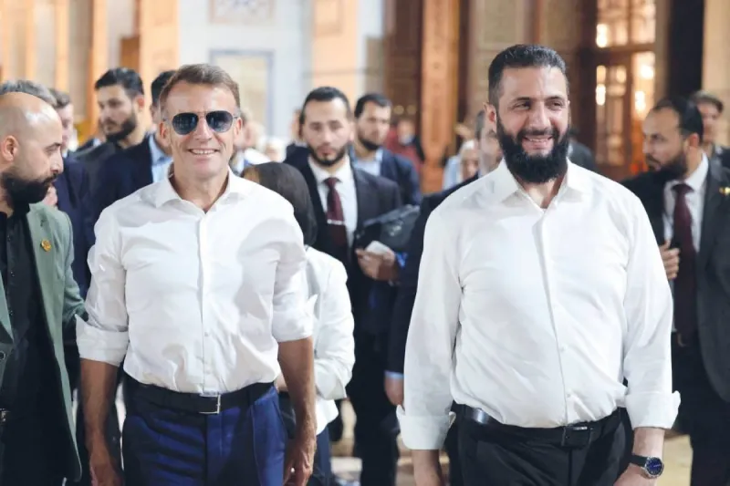 French President Emmanuel Macron and Syrian President Ahmed Al-Sharaa hold a joint press conference at the People's Palace in Damascus.