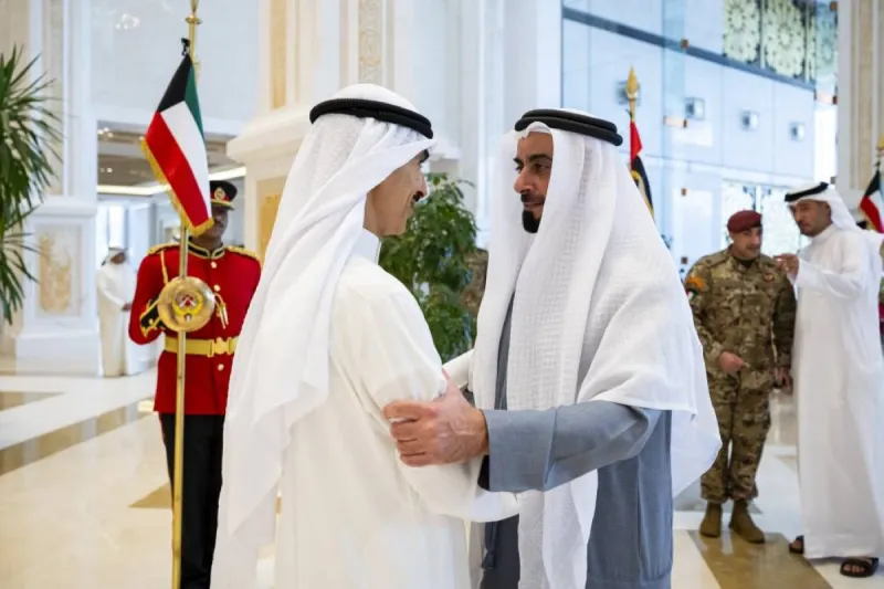Sheikh Mohamed bin Zayed Al Nahyan meets with Kuwait's Amir Sheikh Mishaal Al-Ahmad Al-Jaber Al-Sabah at Bayan Palace during a fraternal visit to Kuwait.