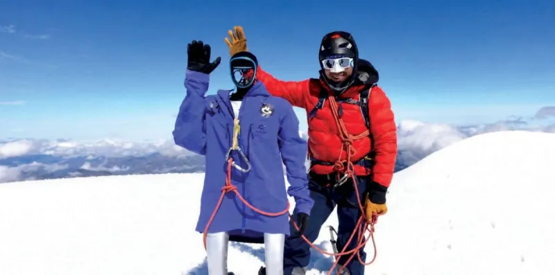 Humanoid robot Pemba wearing a special jacket and mountain footwear near the summit of Chimborazo volcano in Ecuador.