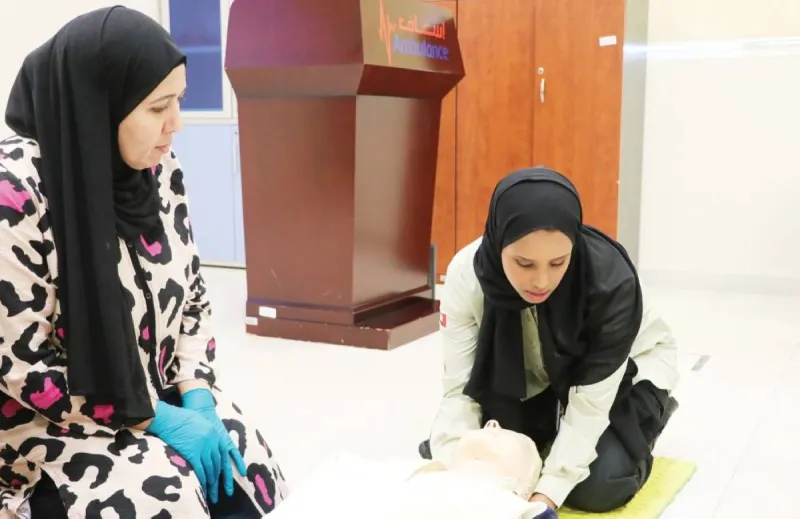 Volunteers from the Dubai Women's Renaissance Association participating in an advanced first aid and CPR training session in cooperation with the Dubai Corporation for Ambulance Services.