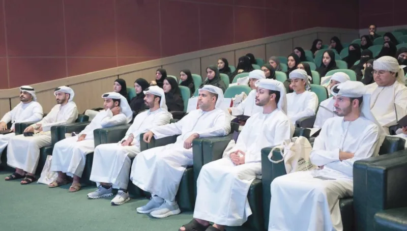 Officials from the Office of Martyrs' Family Affairs and the Khalifa Empowerment Programme 'Aqdar' at the launch of a new package of initiatives for the children and families of martyrs.