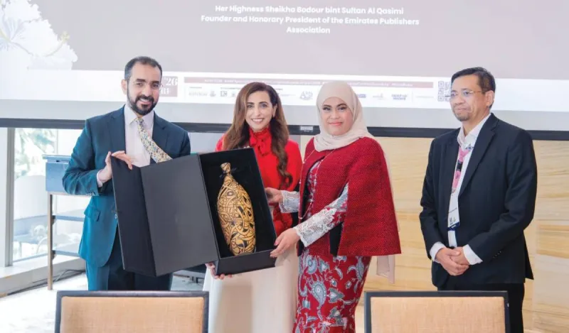 Sheikha Badour bint Sultan Al Qasimi attending the signing of a memorandum of understanding between Manassa Distribution Company and the Malaysian Book City Foundation.