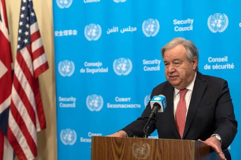 UN Secretary-General António Guterres speaking at a podium, expressing deep concern over escalating military confrontations between the United States and Iran.