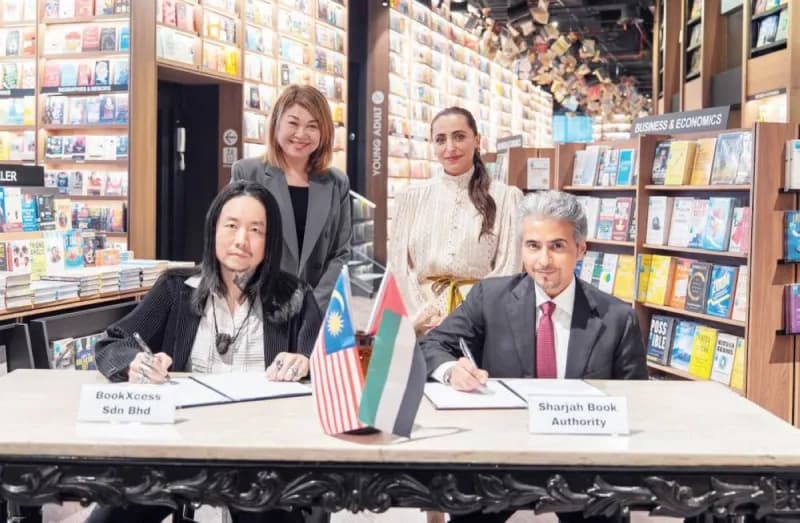 Sheikha Bodour bint Sultan Al Qasimi and Ahmed bin Rakkad Al Ameri at the signing of the MoU with BookXcess Malaysia at The Sunway Library in Malaysia.