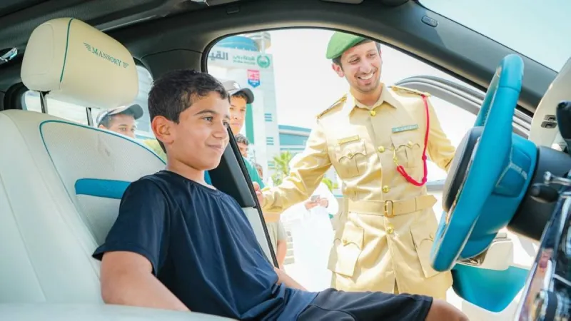 Students participating in Dubai Police's 'Future Security Leaders' programme during a field visit to one of the force's departments.