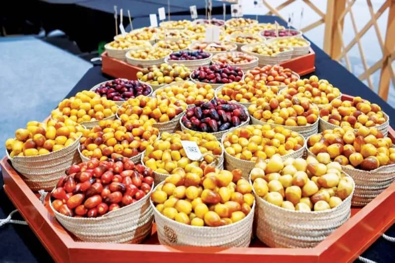 Visitors browse displays of dates and date palm products at the Liwa Date Festival in the Al Dhafra region of Abu Dhabi.