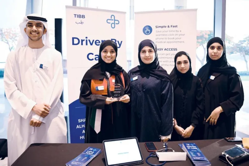 Students from Al Zawraa Secondary School presenting their award-winning smart health app 'Teb' at the Injaz competition.