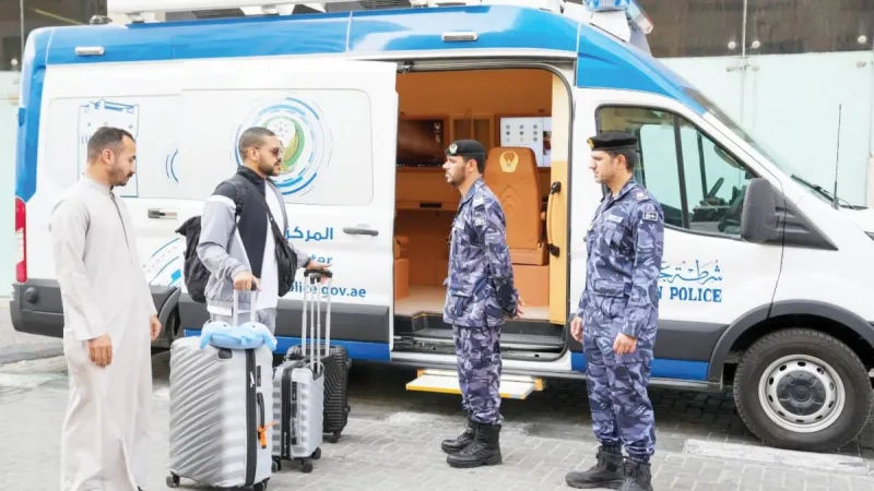 A mobile smart police centre deployed by Ajman Police at the site of the Ajman Corniche Tower fire, providing on-the-ground services to residents affected by the blaze.