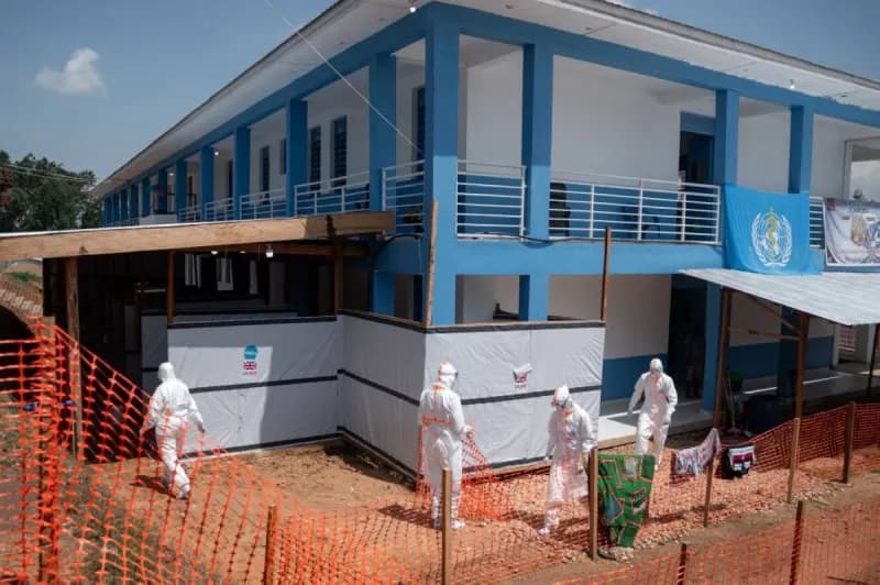 Health workers in protective equipment respond to the Ebola outbreak in the Democratic Republic of Congo.